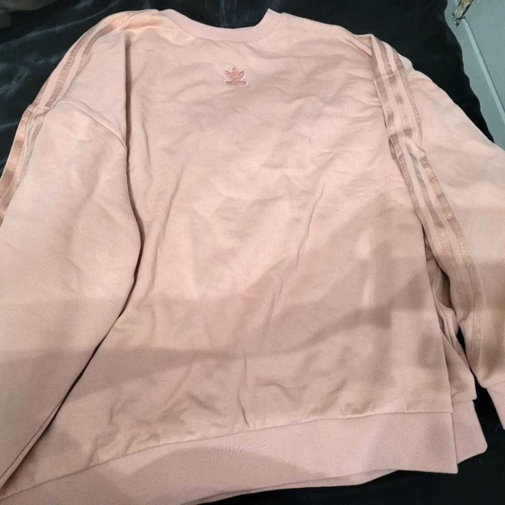 Loose fitting Adidas sweatshirt never been worn